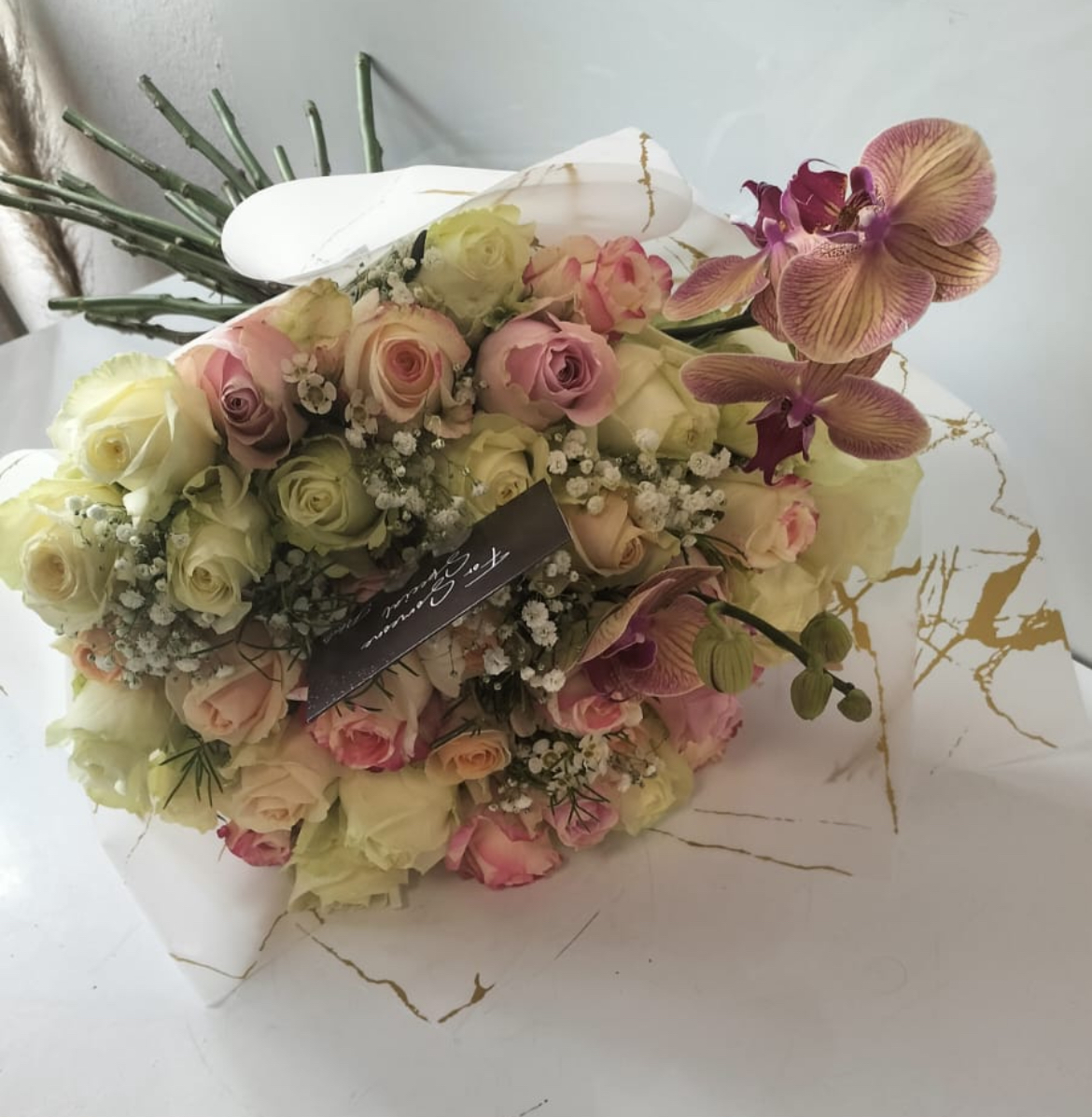 Wrapped bouquet with orchid